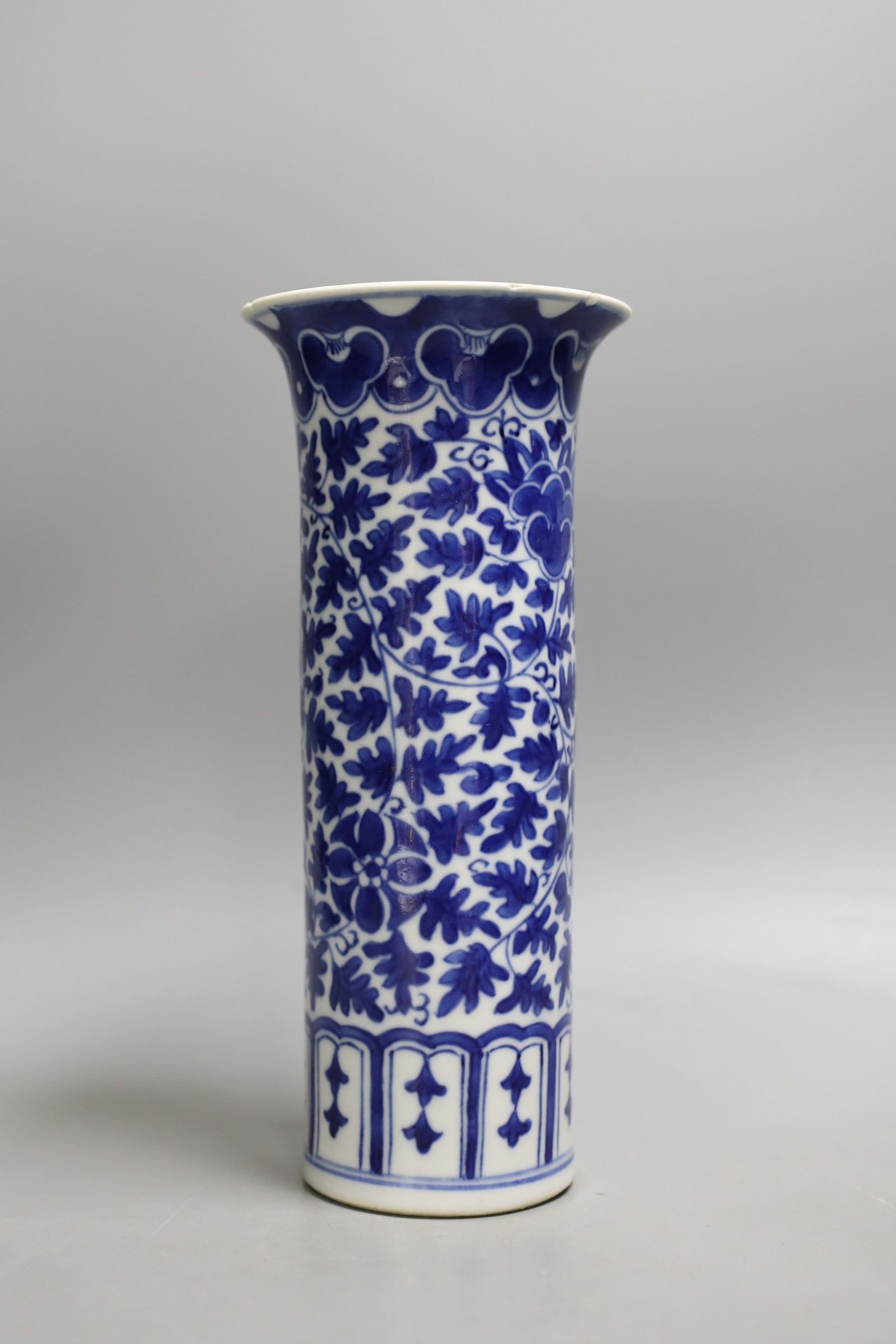 A 19th century Chinese blue and white ‘landscape’ vase, an early 20th century blue and white sleeve vase and three blue and white jars and covers. Tallest 25.5cm